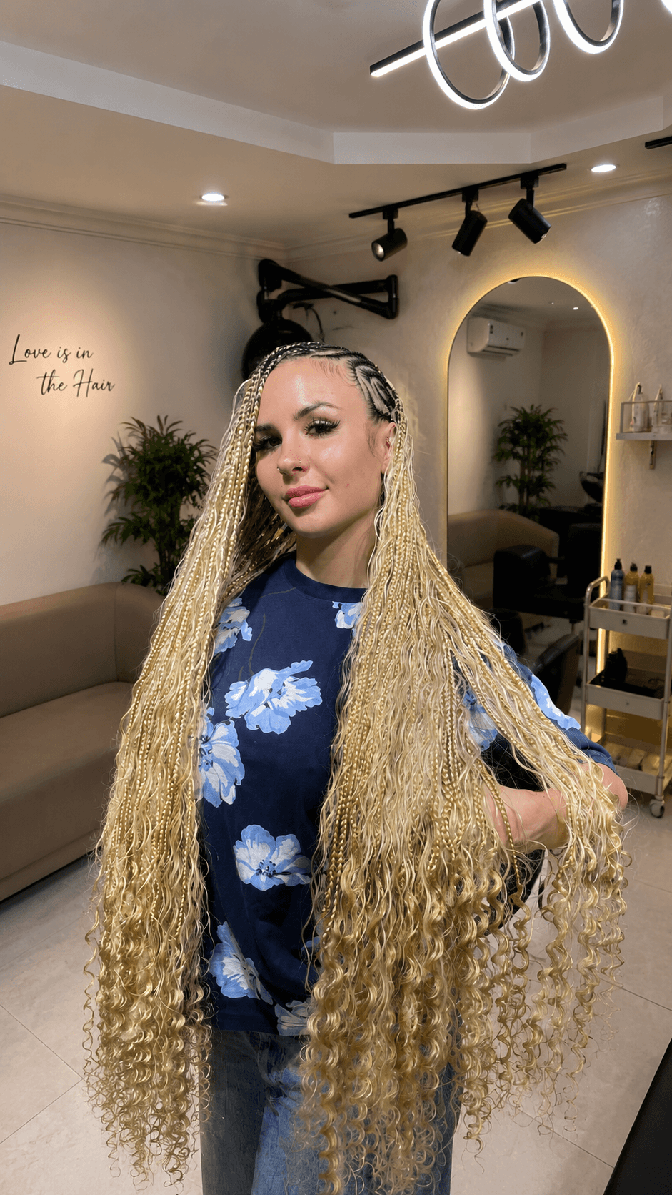 Curly wig styling by Peerless Beauty